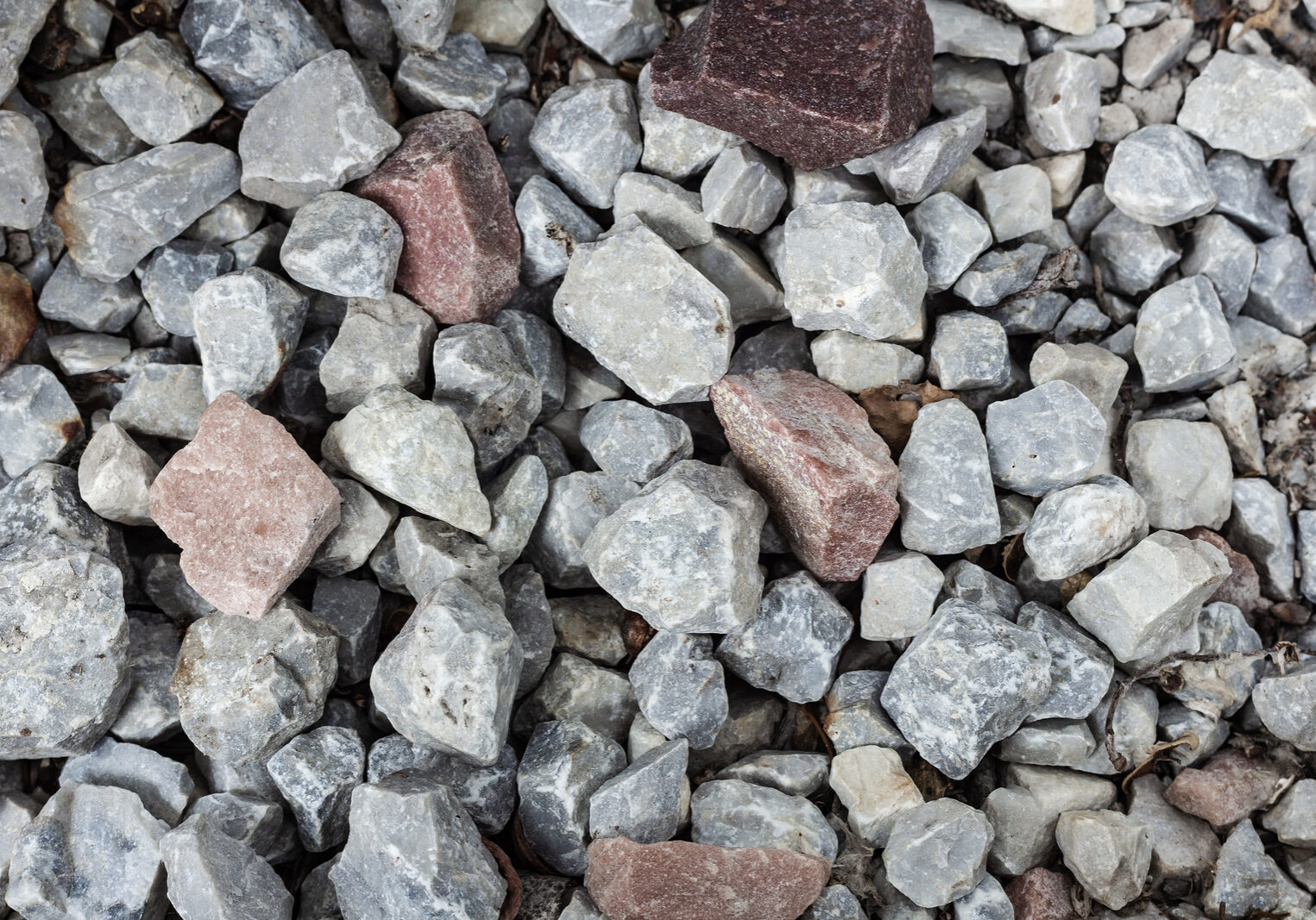 Close Up Of Crushed Rock, Stone Raw Material For Construction In 2 1/2" Crushed Stone