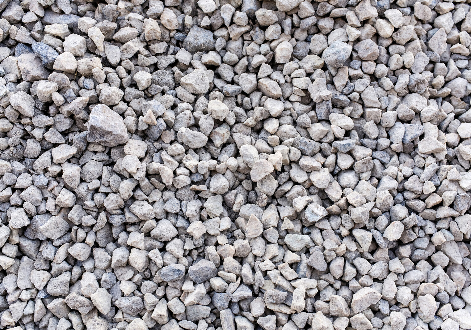 Mound Of Granite Gravel, Stones, Crushed Stone Close-up. Rough S 3/8" Washed Stone